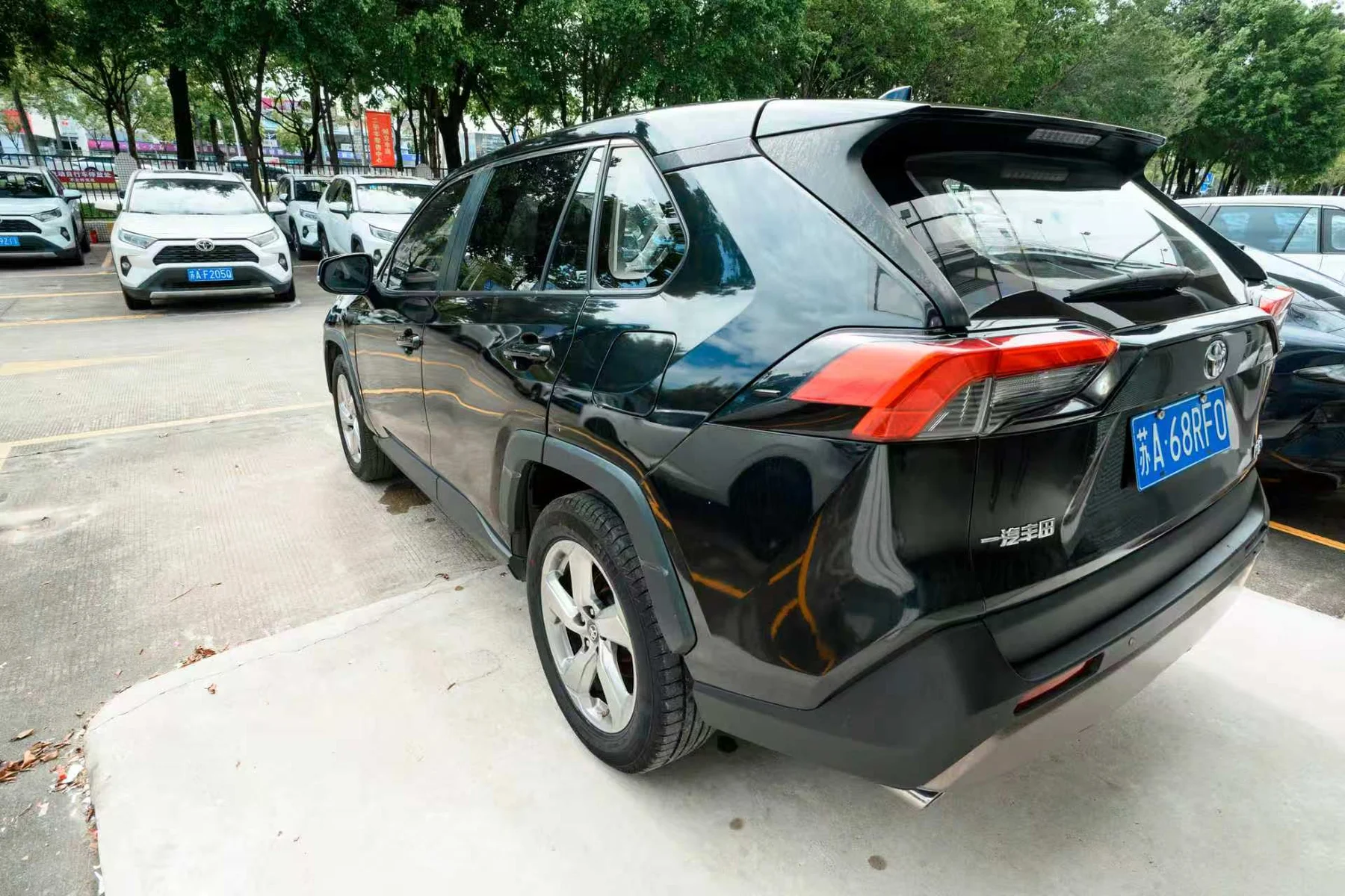 2023 Toyota RAV4 black rear three-quarter view