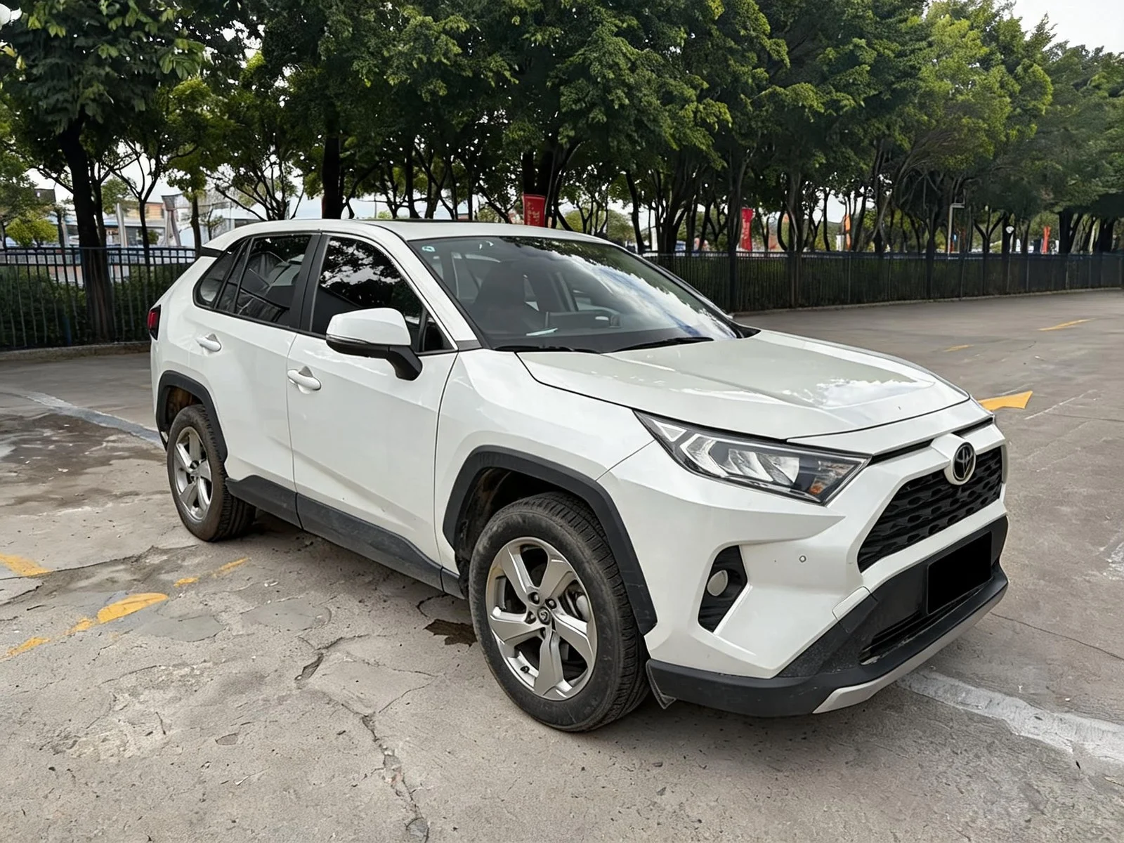 2023 Toyota RAV4 white front three-quarter view