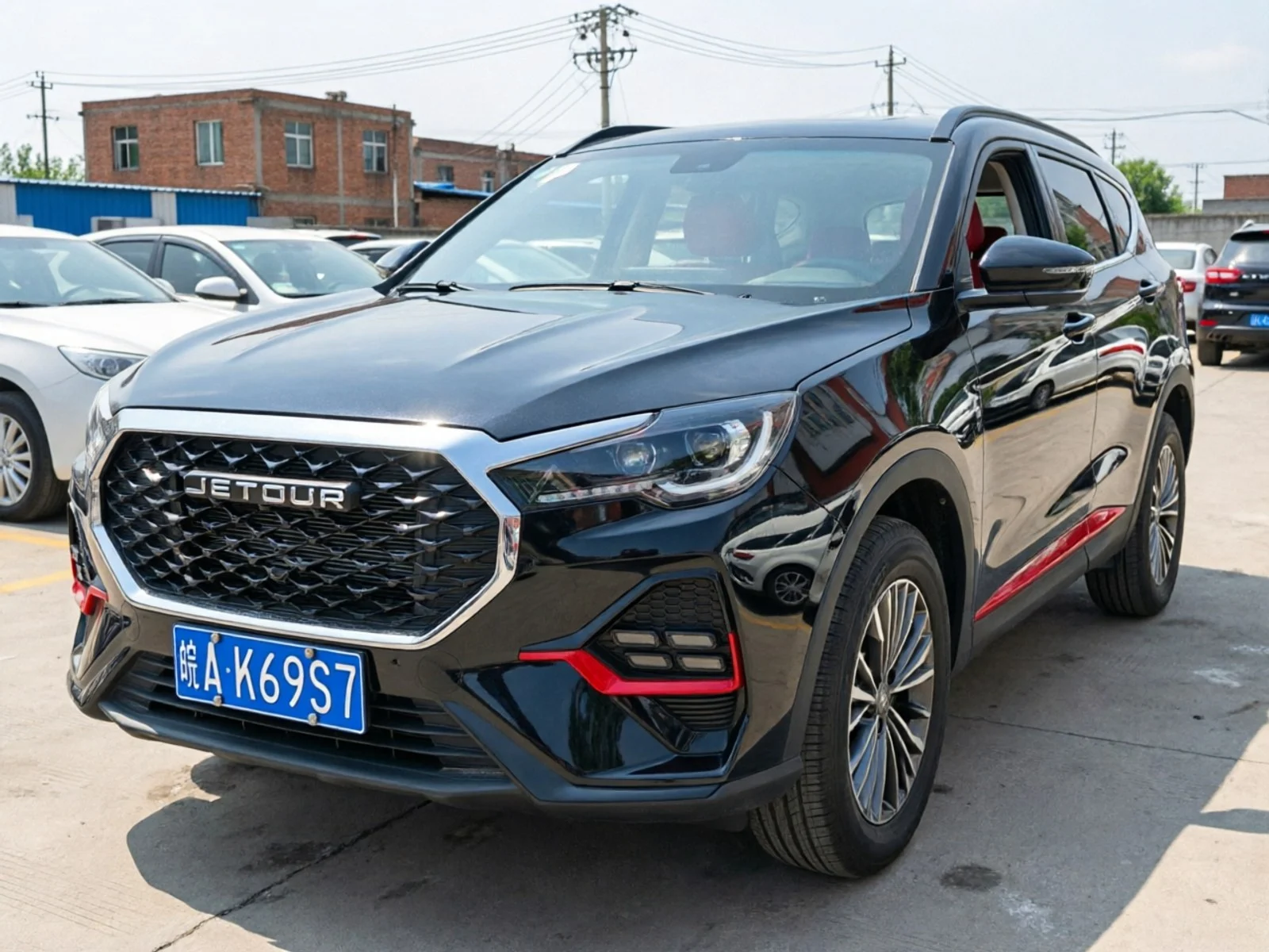 2024 Jetour X70 Pro black front three-quarter view